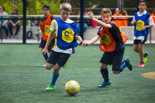 Voetballende kinderen